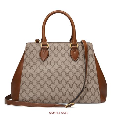 marchio gucci con armatura borsa tessuto lucido|borse Gucci da donna.